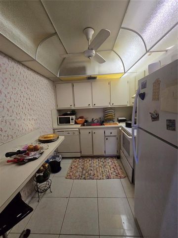 13500 SW 1st St 202U, Pembroke Pines, FL 33027