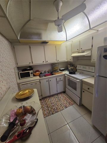 13500 SW 1st St 202U, Pembroke Pines, FL 33027
