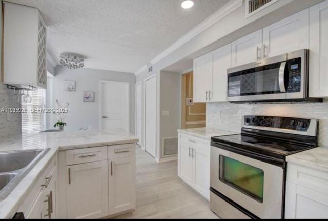 12980 Blue Lake Dr, Wellington, FL 33414