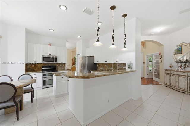 4909 NW 115th Way, Coral Springs, FL 33076