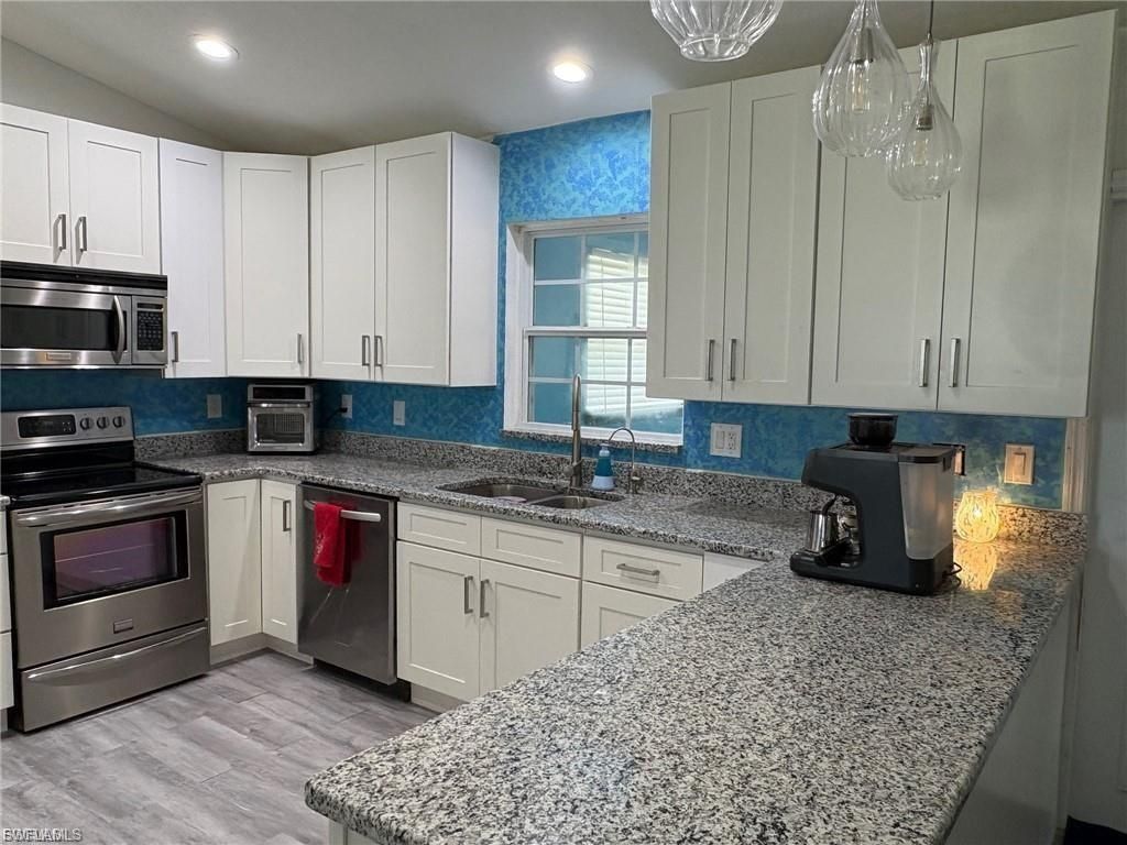 818 SW 8th CT, CAPE CORAL, FL 33991 — photo 3