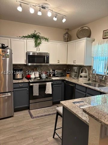 7469 Tam Oshanter Blvd, North Lauderdale, FL 33068