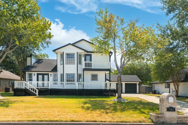 7083 Gentle Breeze Drive, Willis, TX 77318