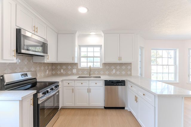 7083 Gentle Breeze Drive, Willis, TX 77318