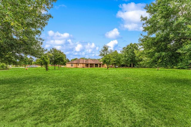 9025 Water Buck Lane, Conroe, TX 77303