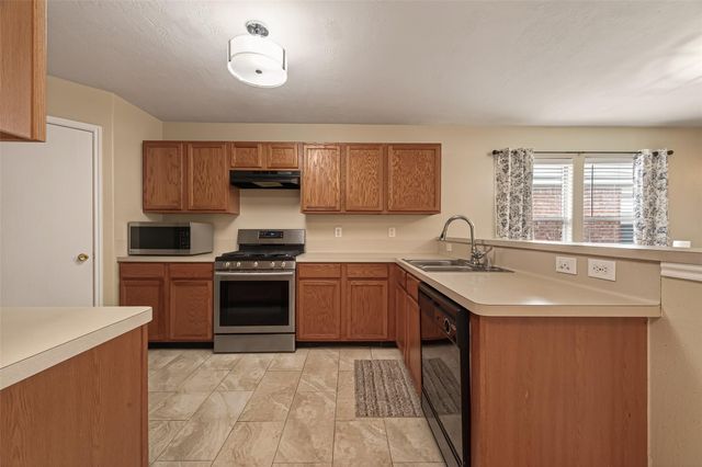 8907 Rainesville Lane, Houston, TX 77075