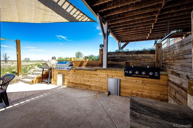 57109 E Kenyon Avenue, Strasburg, CO 80136