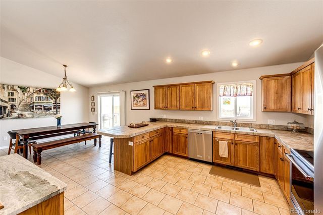 57109 E Kenyon Avenue, Strasburg, CO 80136