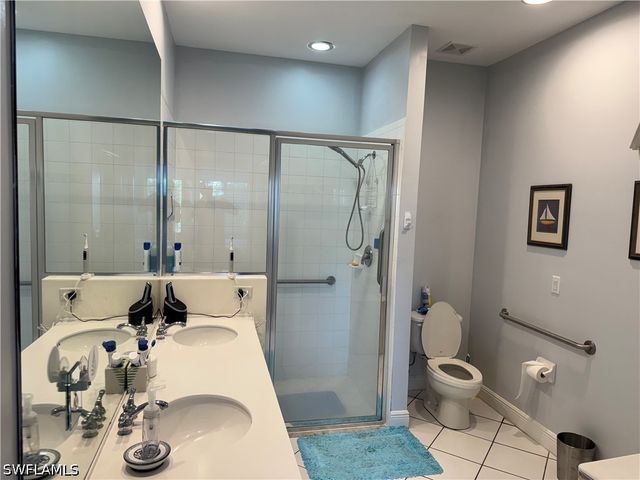 1420 Sweetwater CV 102, Naples, FL 34110