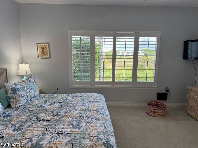 1420 Sweetwater CV 102, Naples, FL 34110