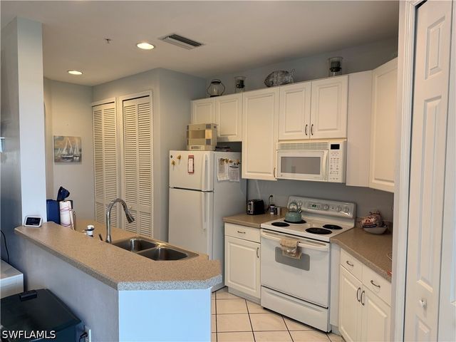 1420 Sweetwater CV 102, Naples, FL 34110