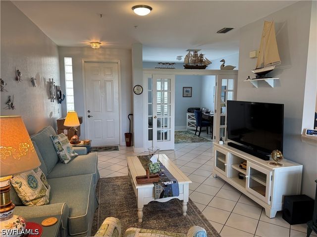 1420 Sweetwater CV 102, Naples, FL 34110