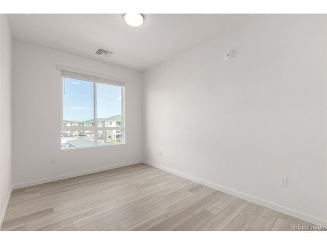 6153 N Ceylon St 3-303, Denver, CO 80249