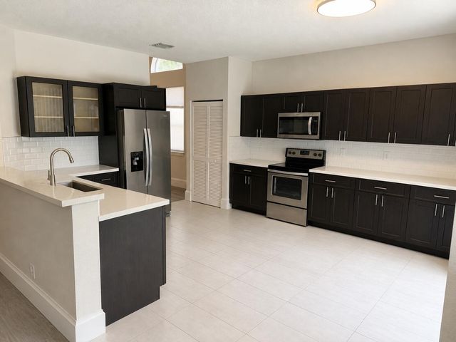 6330 NW 80th Drive, Parkland, FL 33067