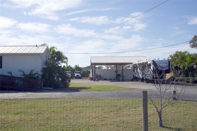 1007 77TH STREET E, Palmetto, FL 34221