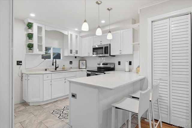 9322 207th Street, Queens Village, NY 11428