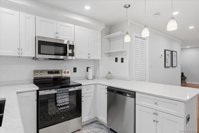 9322 207th Street, Queens Village, NY 11428