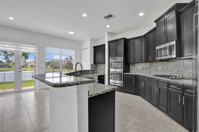 10340 Lake Vista Court, Parkland, FL 33076