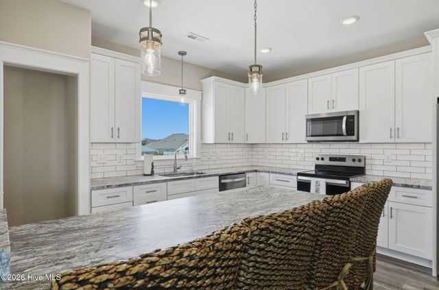 1420 E Beach Drive, Oak Island, NC 28465