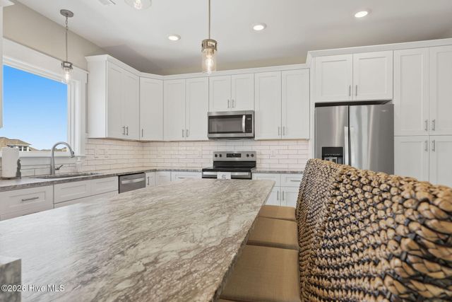 1420 E Beach Drive, Oak Island, NC 28465