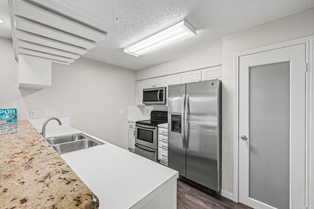 5913 Woodway Place Court, Houston, TX 77057