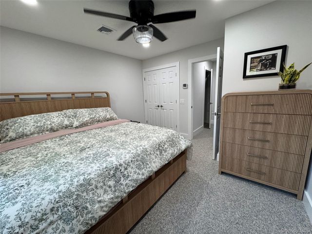 49 Canoe Place Road 312, Hampton Bays, NY 11946