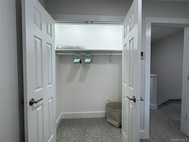 49 Canoe Place Road 312, Hampton Bays, NY 11946