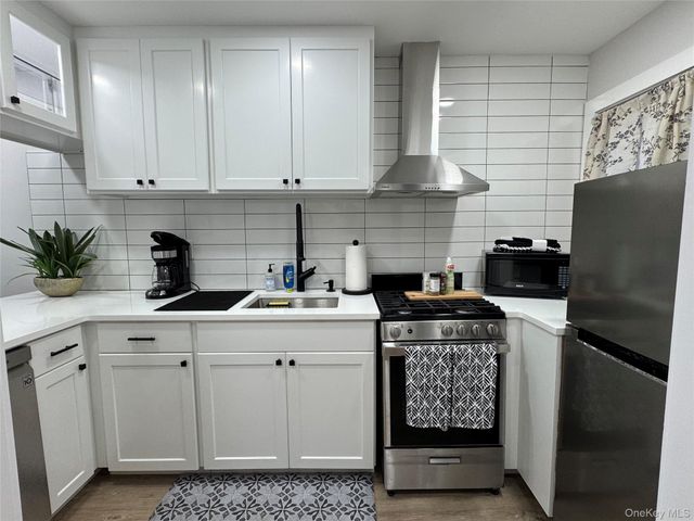 49 Canoe Place Road 312, Hampton Bays, NY 11946