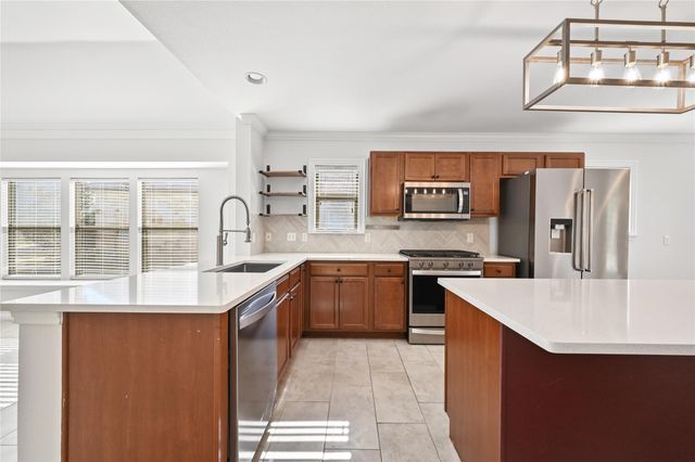 6909 Bay City BND, Austin, TX 78725