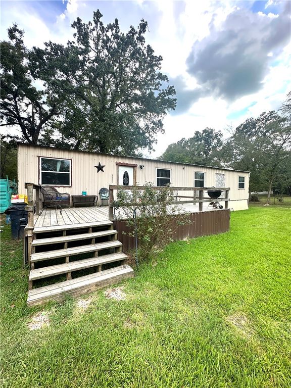 10682 Foxfire Drive, Plantersville, TX 77363 — exterior