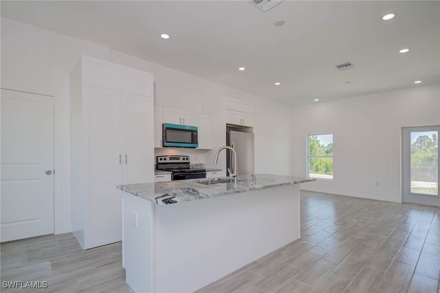 2620 57th ST W, Lehigh Acres, FL 33971