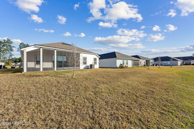 70414 WINDING RIVER Drive, Yulee, FL 32097