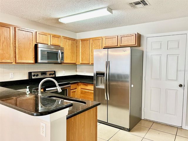 12973 LEXINGTON SUMMIT STREET, Orlando, FL 32828
