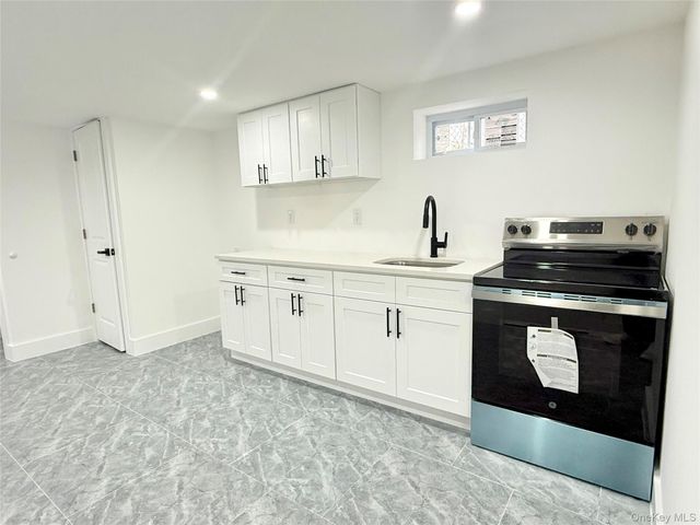 12323 Milburn Street, Springfield Gardens, NY 11413