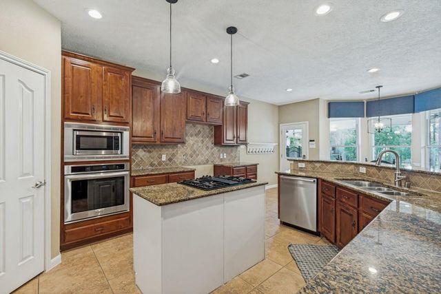 12406 Hawkin Court, Magnolia, TX 77354