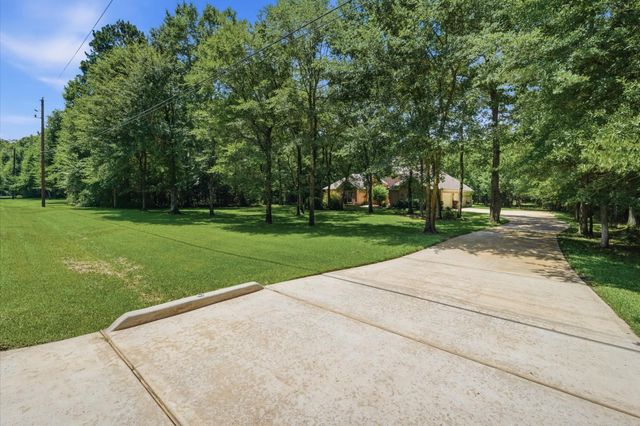 33206 Windcrest Estates Boulevard, Magnolia, TX 77354