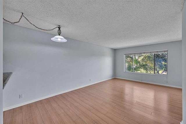 906 Twin Lakes Drive 8-J, Coral Springs, FL 33071