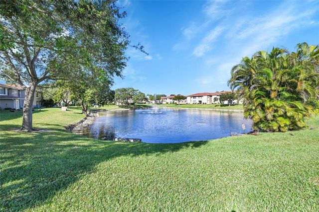 906 Twin Lakes Drive 8-J, Coral Springs, FL 33071