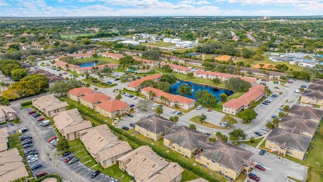 906 Twin Lakes Drive 8-J, Coral Springs, FL 33071