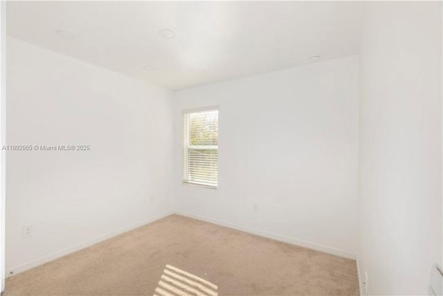 1032 CHAMPION AVE, Lehigh Acres, FL 33971