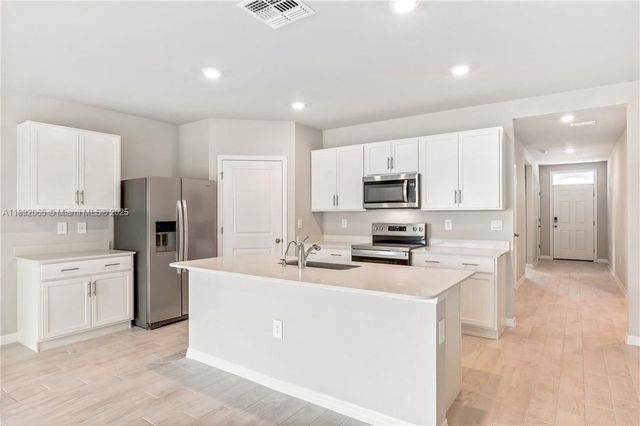 1032 CHAMPION AVE, Lehigh Acres, FL 33971