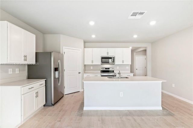 1032 CHAMPION AVE, Lehigh Acres, FL 33971