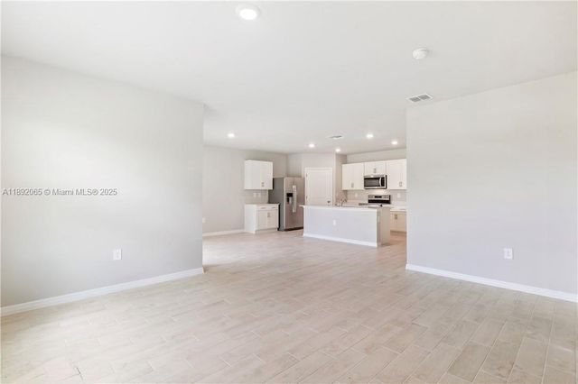 1032 CHAMPION AVE, Lehigh Acres, FL 33971