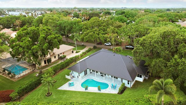 18457 SE Heritage Oaks Lane, Jupiter, FL 33469