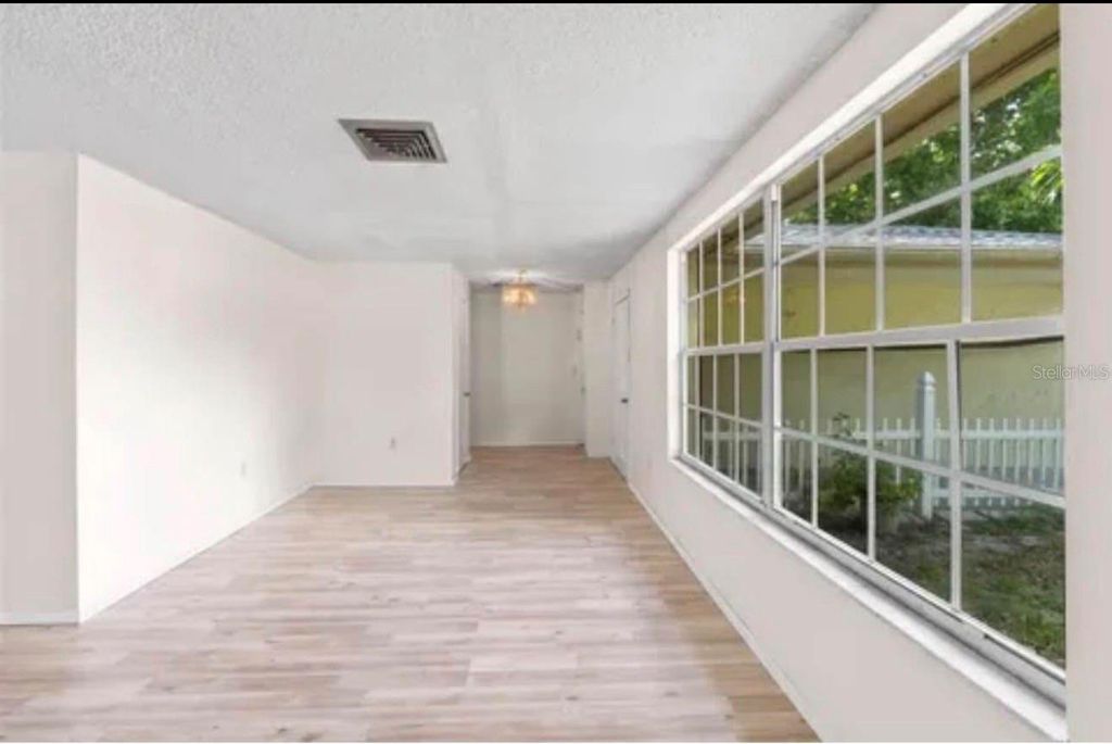 Image 3 of property listing at 7035 SANDALWOOD DRIVE, Port Richey, FL 34668