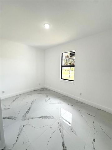 612 Ames ST E, Lehigh Acres, FL 33974