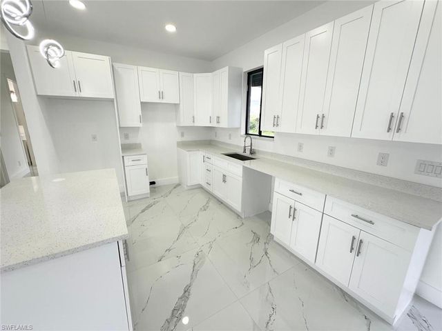 612 Ames ST E, Lehigh Acres, FL 33974