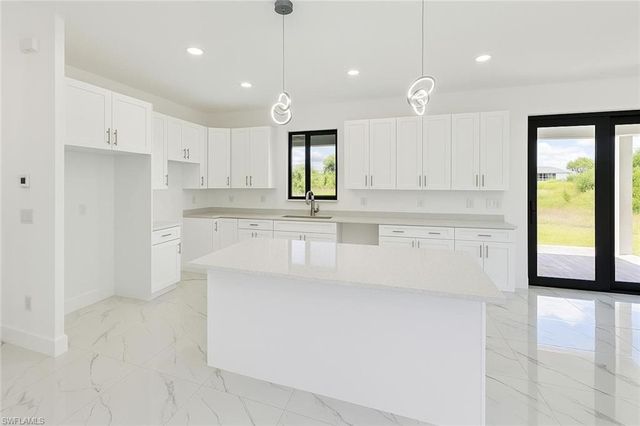 612 Ames ST E, Lehigh Acres, FL 33974