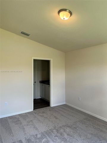 9114 Aegean Circle, Lehigh Acres, FL 33936
