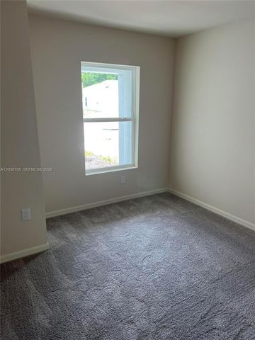 9114 Aegean Circle, Lehigh Acres, FL 33936